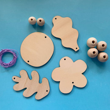 Mobile DIY kit with forest shapes